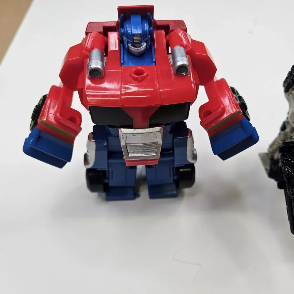 Lot of 5 Transformers Action Figures - Optimus Prime, Bumblebee & More